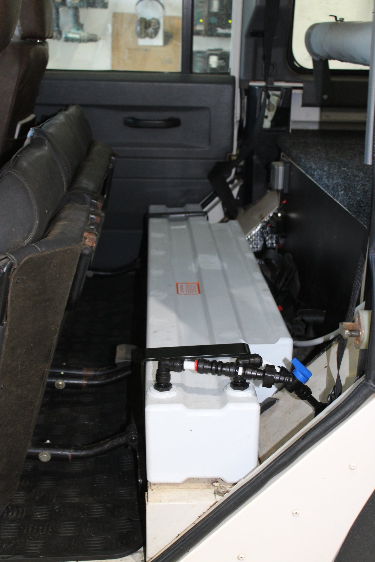 Defender Water tank under seat