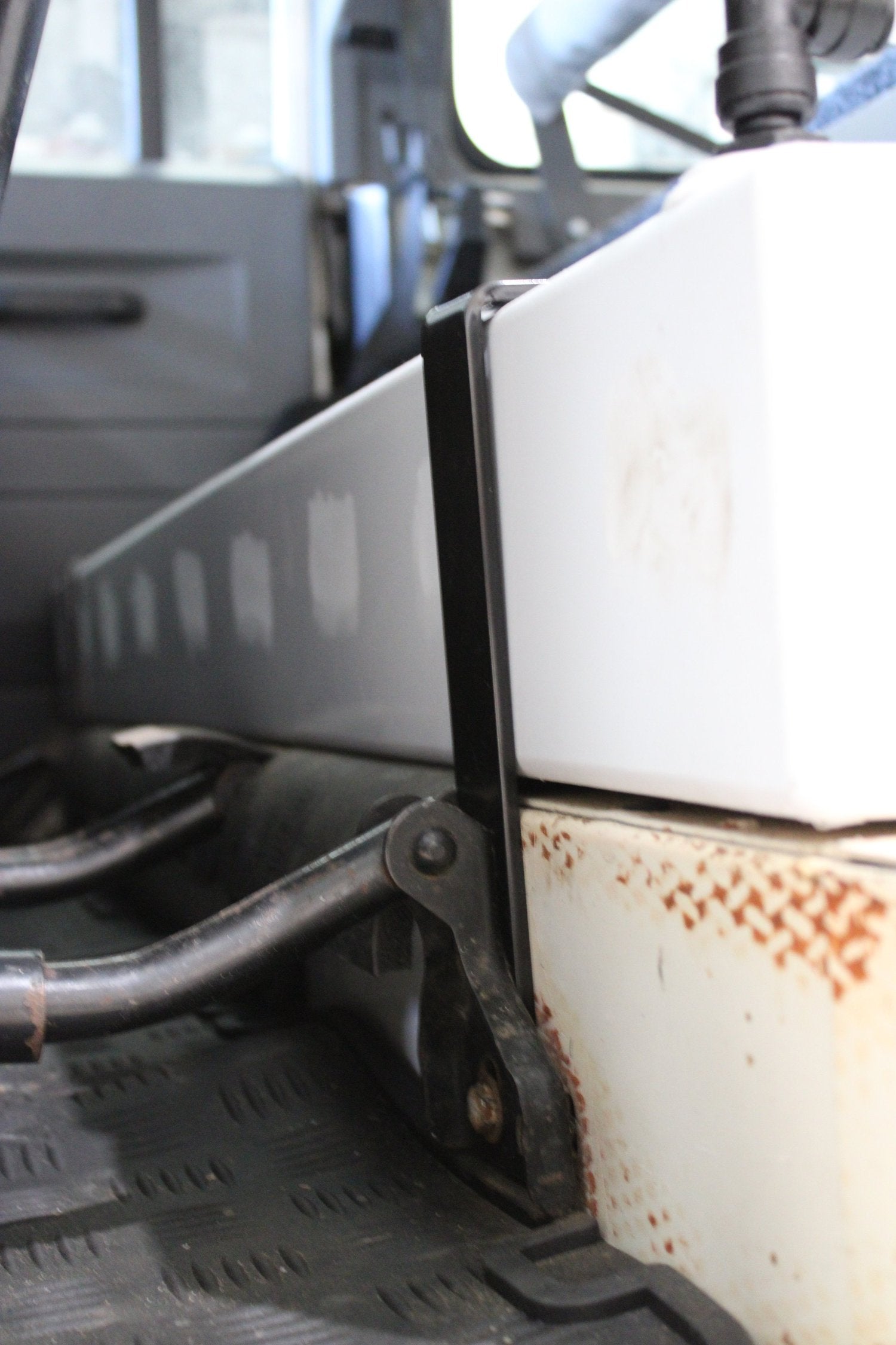 Defender Water tank under seat