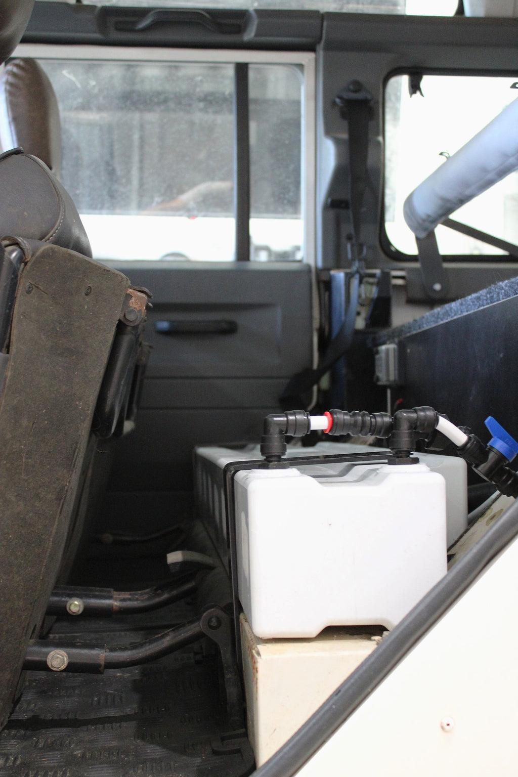 Defender Water tank under seat